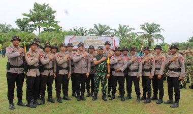 Danyon B Pelopor Hadiri Upacara Penutupan TMMD ke-125